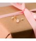 Pendientes de bebe con flor de oro