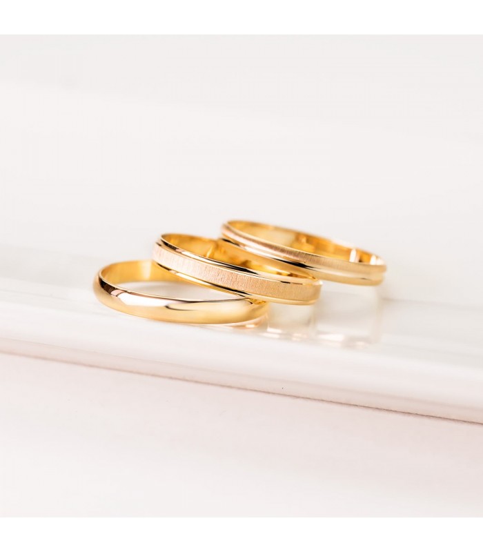 Fedi nuziale Clarissa in oro giallo 750 millesimi. Anello oro giallo 18K.