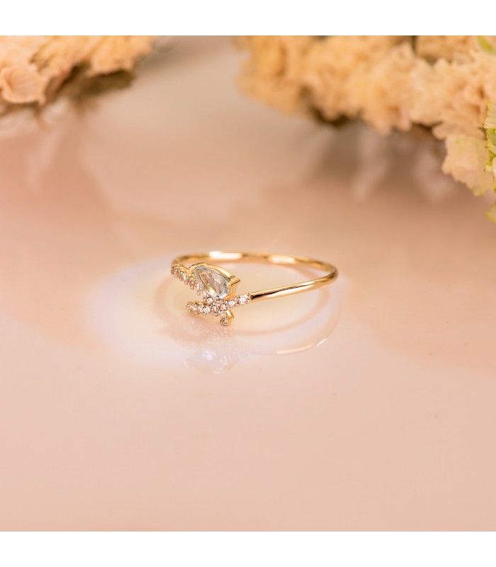 Anello ametista, Modello Meraki in oro giallo e forma di fiocco -  Pietra semipreziosa Topazio azzurro a goccia
