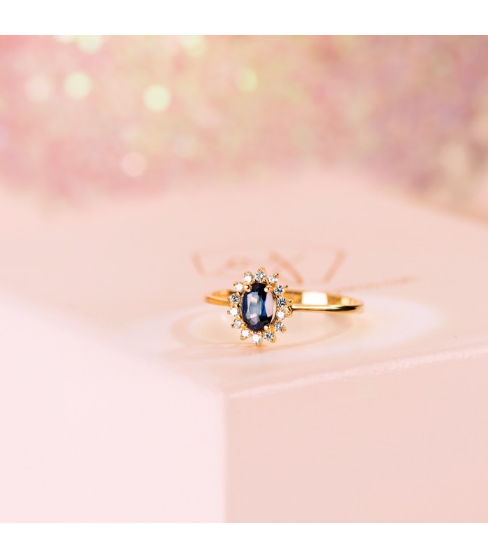 Anillo de pedida en oro 18 kilates. Sortija de mujer con diamantes y zafiro.