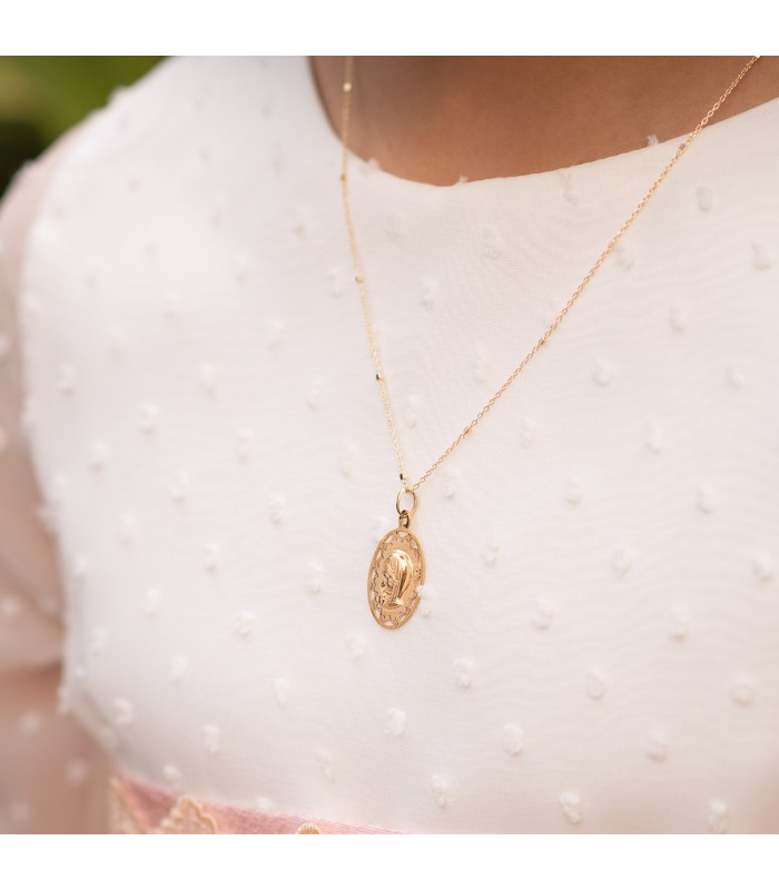 medalla virgen oro