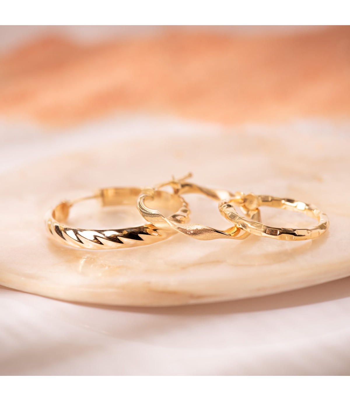 Orecchini a cerchio Twisted oro giallo 18kt 25 mm