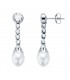Pendientes de novia en oro blanco con perlas. Pendientes largos, chatón, elegantes. Joyería online Alda.