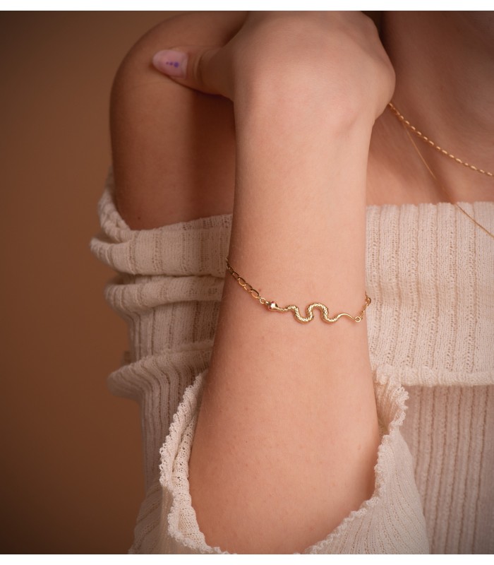 Bracciale donna oro 18kt Serpente, catenina cheval, pietre rubino.