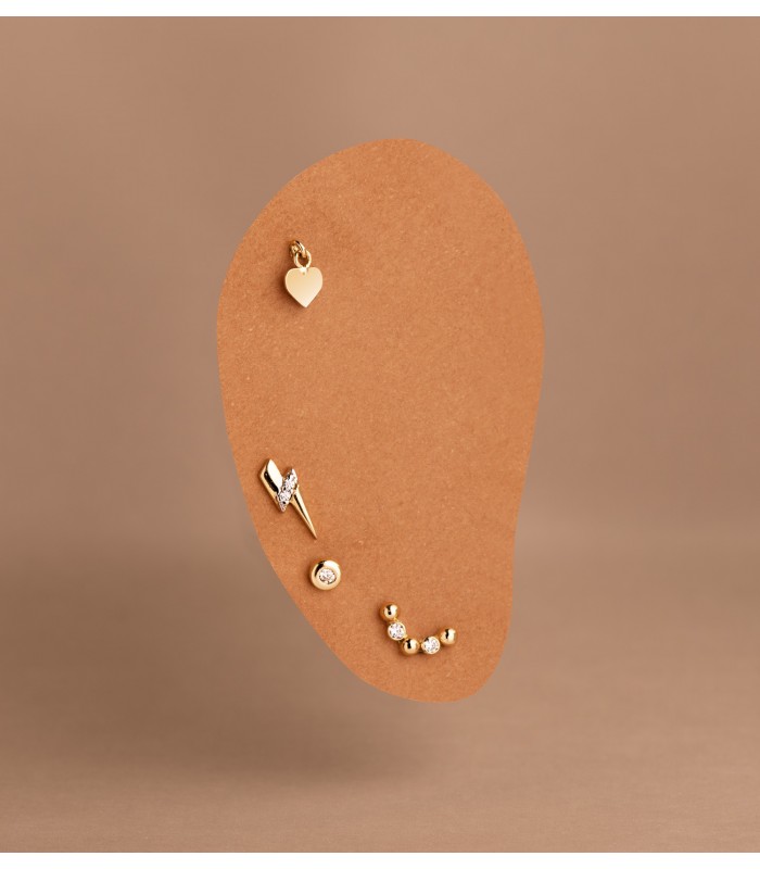 Piercing piedrita, pendientes en la oreja de cadenita, corazón, circonita, bolitas, rayo.