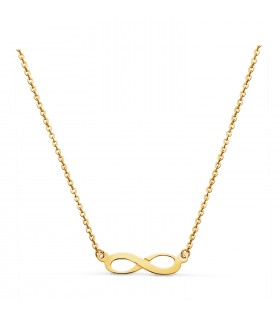 Collana infinito in oro da donna, composta da una catena a maglia diamantata e ciondolo con il simbolo dell'infinito.