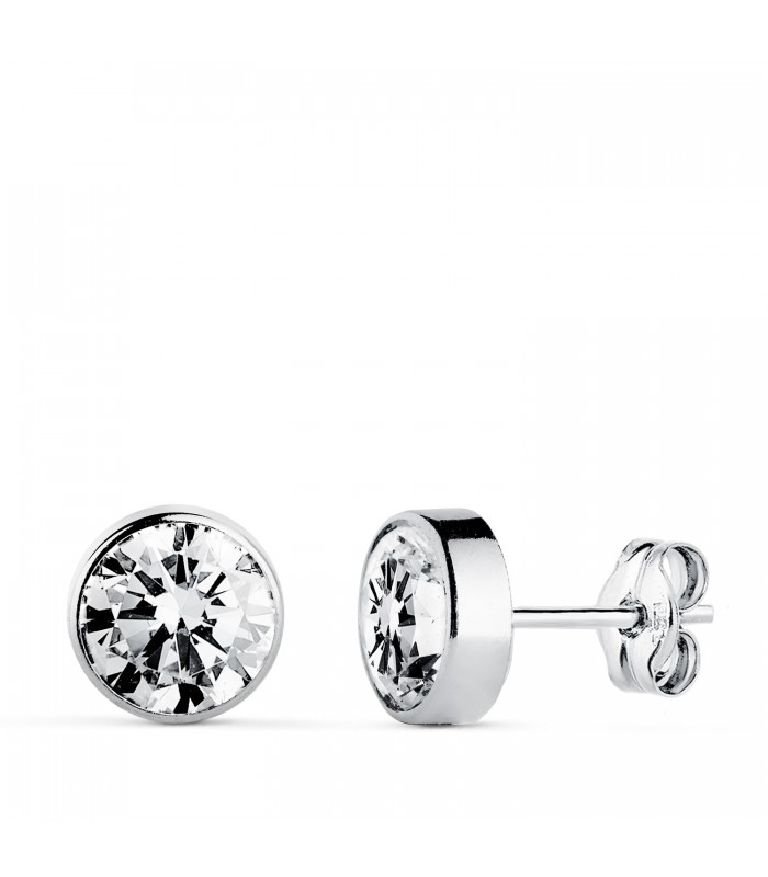 Pendientes Noly Oro Blanco 18K, chatones con circonitas 7mm, engaste bisel y cierre presión.