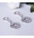Pendientes boda boho Oro blanco 18 ktes largos circulos circonitas