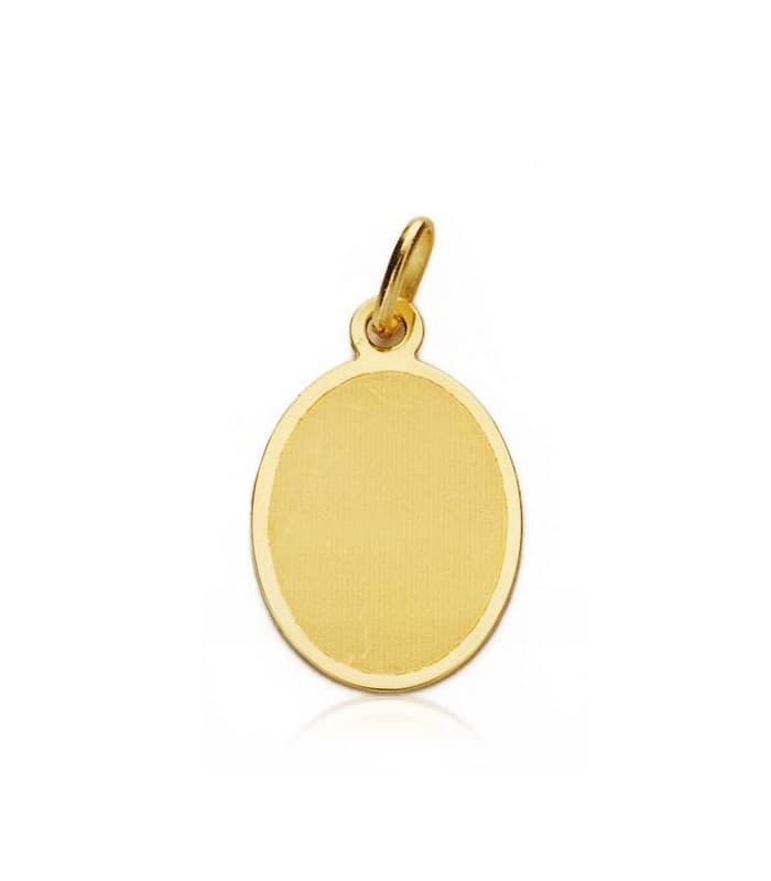 Medalla  niño y reloj oval grande oro 18ktes