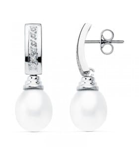 Pendientes de boda en oro blanco de 18 kilates circonitas chatón y perla cultivada. Joyería online.