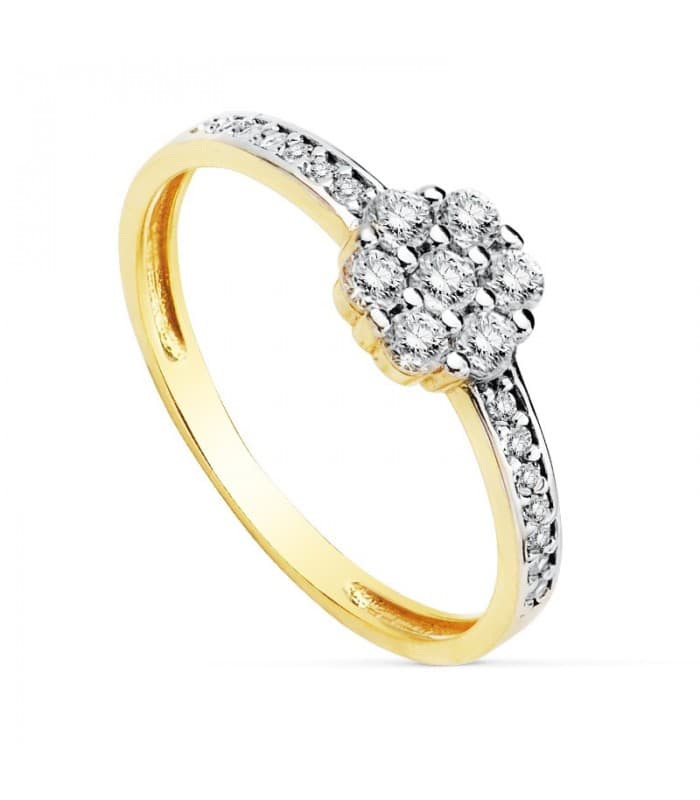Sortija de Mujer Oro amarillo 18K Jaione Flor cuajo circonitas engastadas en carril